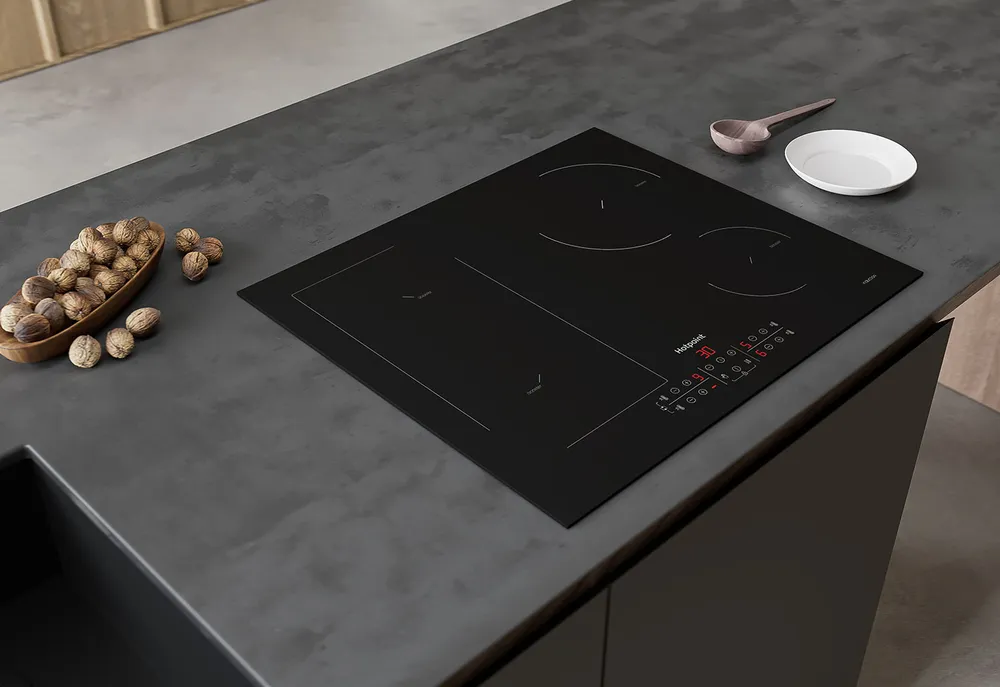 Детальное фото товара: Hotpoint HB 1560B NE индукционная поверхность