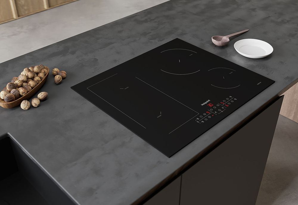 Hotpoint HB 1560B NE Детальное фото товара: Hotpoint HB 1560B NE индукционная поверхность